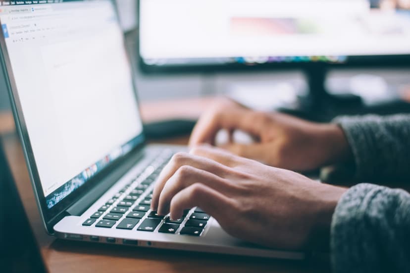 Developer implementing code with focused attention to detail